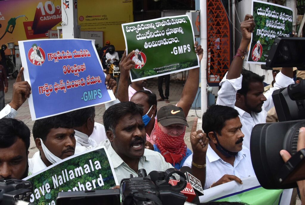 Protesters holding placards during go to CM camp office Protest