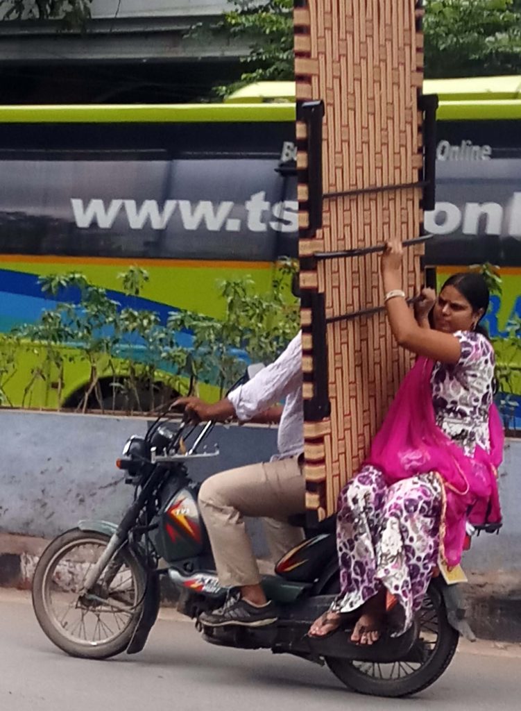 Carrier high fares led couple to carry bed on bike