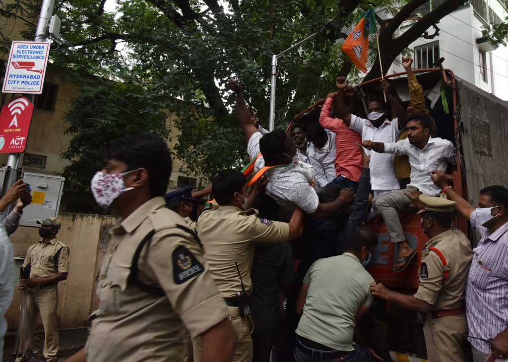 Police detains BJP workers holding BJP flags in Telangana State