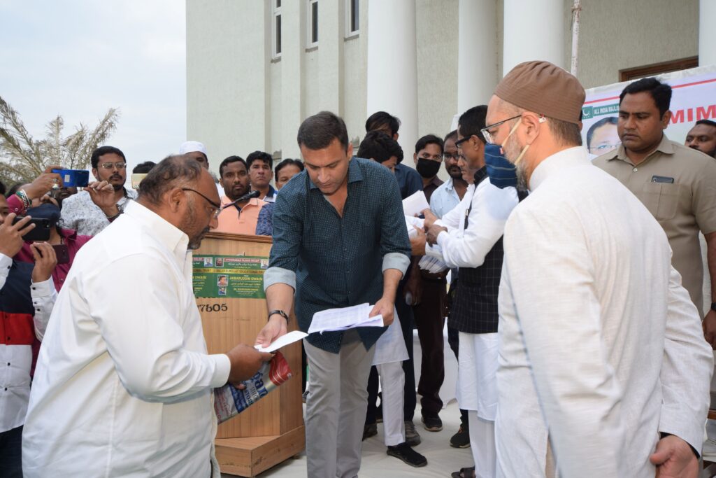 AIMIM distributes Financial Aid to Flood victims of Hyderabad