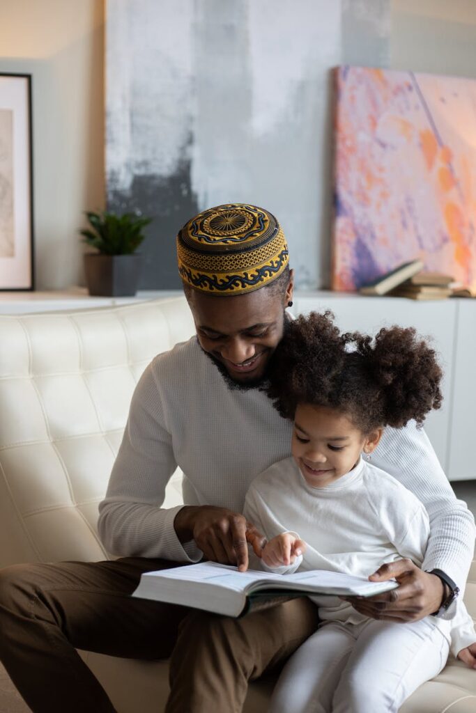 Birthday Wishes According, Islam still practiced differently, Islamic Knowledge, Islam, Muslims, delighted black father reading book to positive daughter