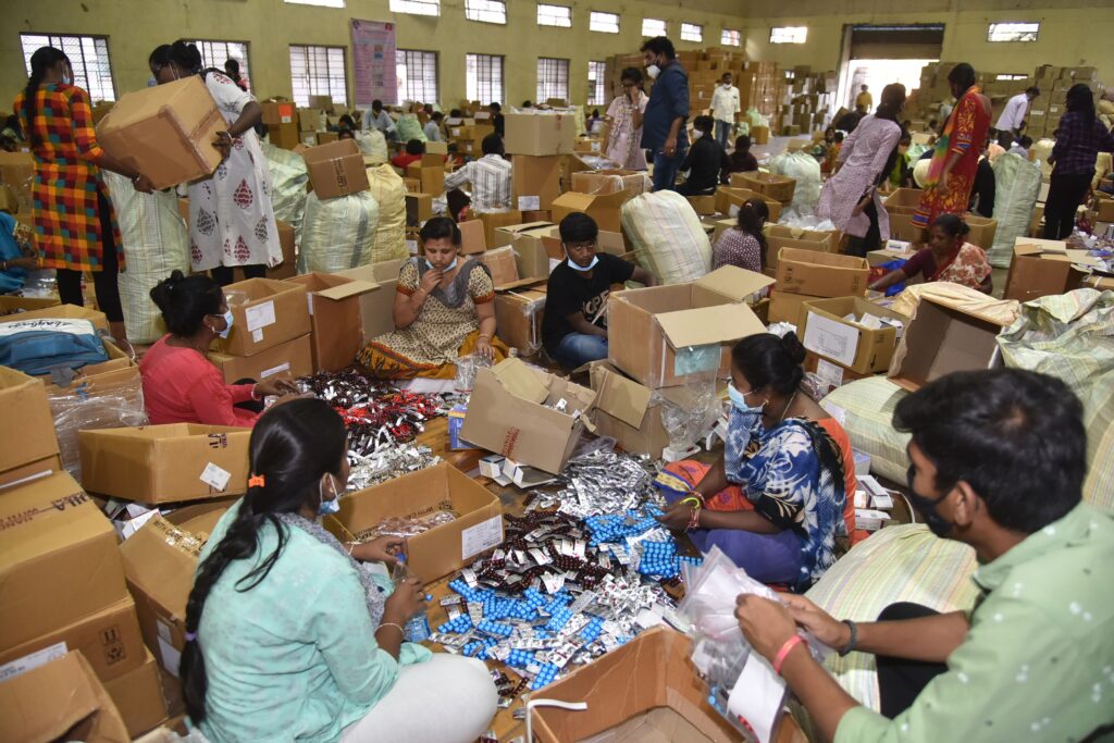 Telangana workers pack COVID, Self Isolation, Home treatment, Medicines, Kits, COVID home kits, Workers Packing