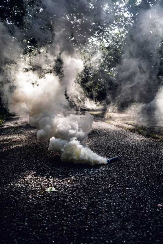 photo of smoke grenade on ground, New Zealand to cancel, Pakistan, Visit Pakistan 