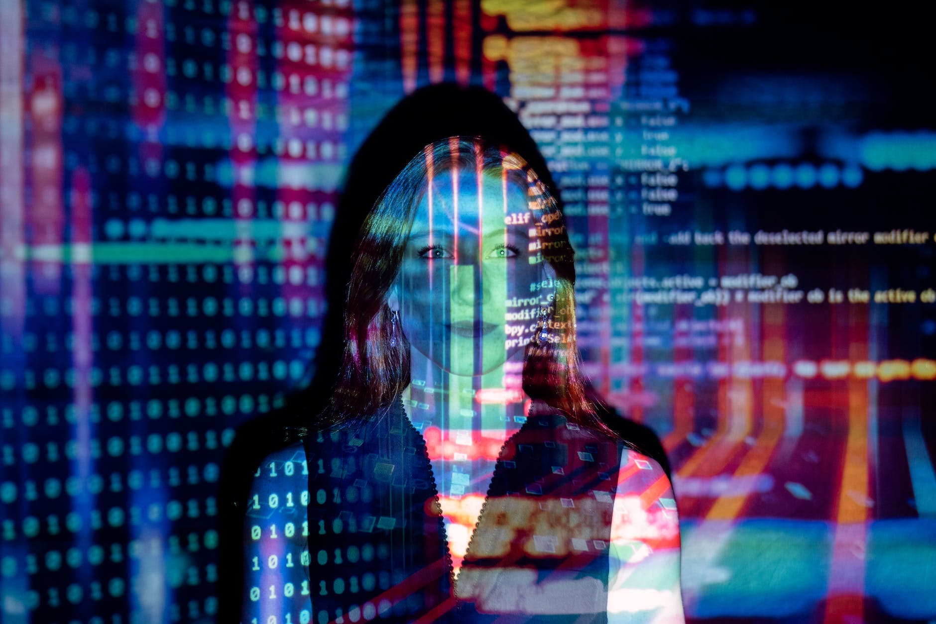 code projected over woman, Can AI replace humans, 2030, Artificial Intelligence 