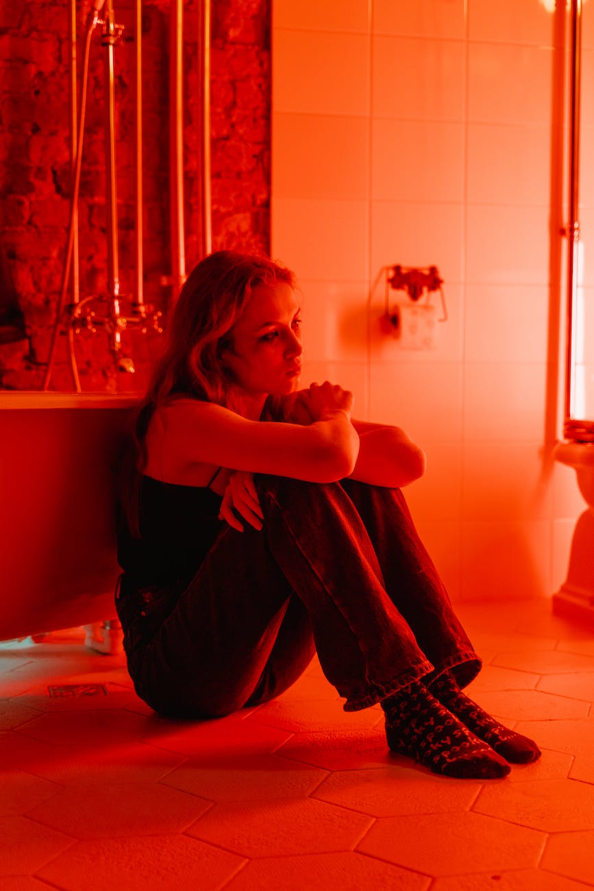 a woman sitting beside a bathtub, Psychiatric Patients, Doctors, Mental Health 
